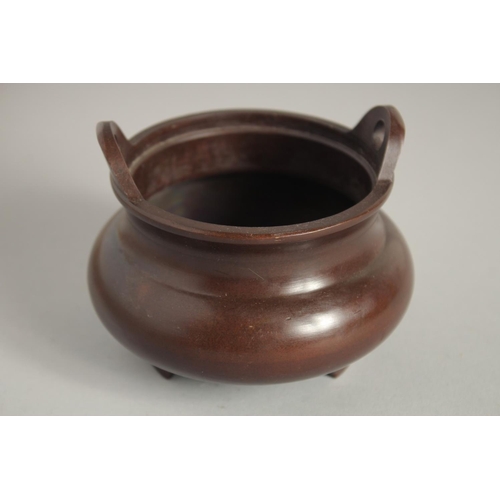 1211 - A SMALL CHINESE BRONZE CIRCULAR CENSER. 4ins diameter.