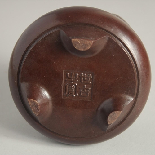 1211 - A SMALL CHINESE BRONZE CIRCULAR CENSER. 4ins diameter.