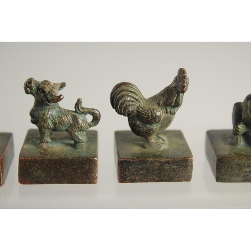 1234 - SIX SMALL CHINESE BRONZE SEALS.