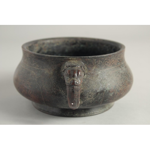 1238 - A CHINESE SILVER INLAID CIRCULAR CENSER with elephant handles. 5ins diameter.