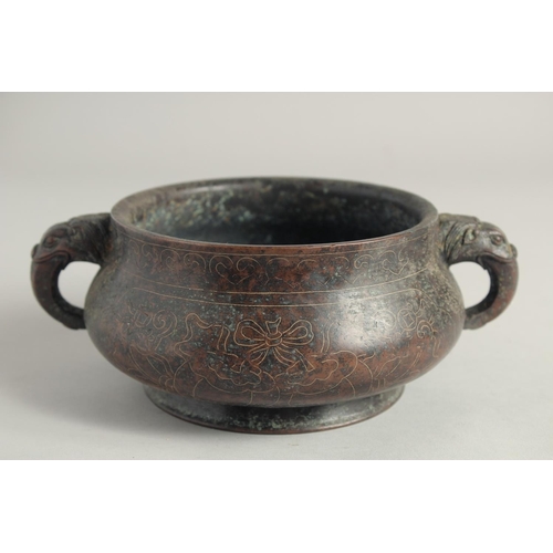 1238 - A CHINESE SILVER INLAID CIRCULAR CENSER with elephant handles. 5ins diameter.