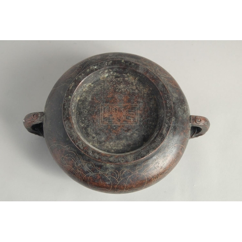 1238 - A CHINESE SILVER INLAID CIRCULAR CENSER with elephant handles. 5ins diameter.