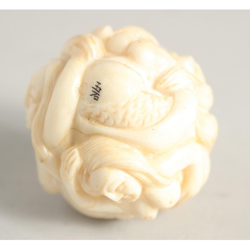 1244 - A CHINESE CARVED BALL NETSUKE 