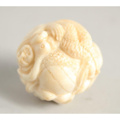 1244 - A CHINESE CARVED BALL NETSUKE 