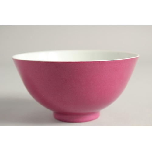 1248 - A CHINESE PINK GLAZE PORCELAIN BOWL six character mark to base, 14cm diameter.