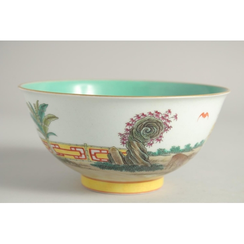 1252 - A CHINESE FAMILLE ROSE PORCELAIN BOWL the interior with turquoise glaze. 17cm diameter.