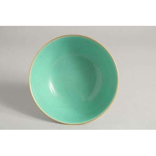 1252 - A CHINESE FAMILLE ROSE PORCELAIN BOWL the interior with turquoise glaze. 17cm diameter.