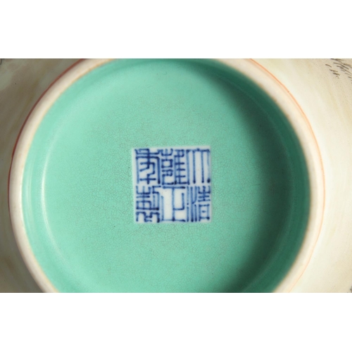 1252 - A CHINESE FAMILLE ROSE PORCELAIN BOWL the interior with turquoise glaze. 17cm diameter.