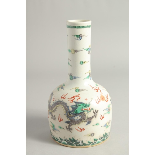 1254 - A CHINESE FAMILLE VERTE PORCELAIN BOTTLE VASE painted with dragons and the flaming pearl of wisdom. ... 