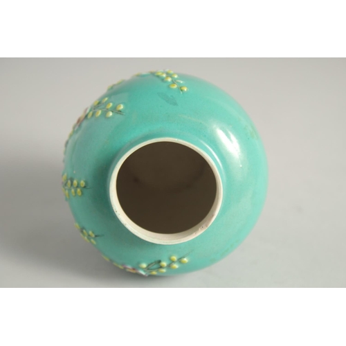 1258 - A SMALL CHINESE TURQUOISE GLAZE JAR AND COVER.