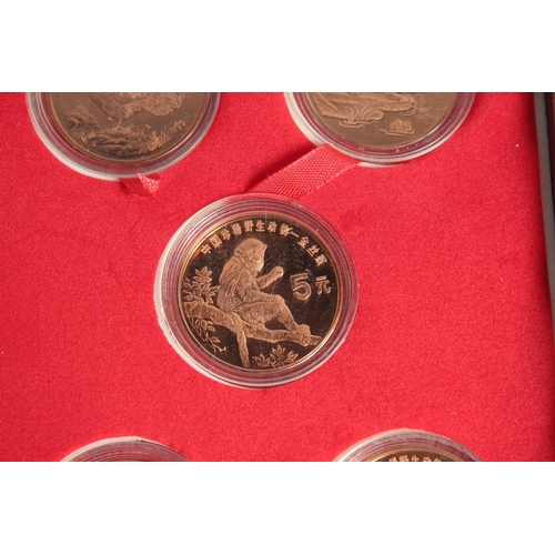 1268 - A COLLECTION OF TEN CHINESE COINS in presentation box.