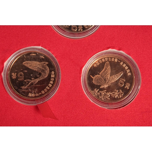 1268 - A COLLECTION OF TEN CHINESE COINS in presentation box.