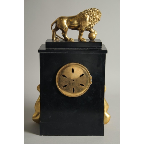 1280 - A GOOD FRENCH GILT BRONZE AND BLACK MARBLE CLOCK with lion surmount. 1ft 5ins high.