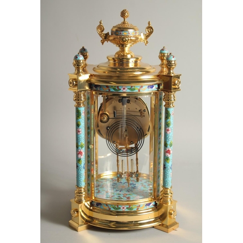 1282 - A GOOD GILT METAL AND CLOISONNE ENAMEL CIRCULAR COLUMN CLOCK with urn finial. 1ft 6ins high.