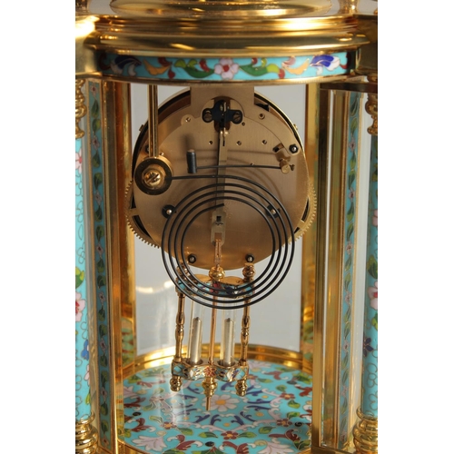 1282 - A GOOD GILT METAL AND CLOISONNE ENAMEL CIRCULAR COLUMN CLOCK with urn finial. 1ft 6ins high.