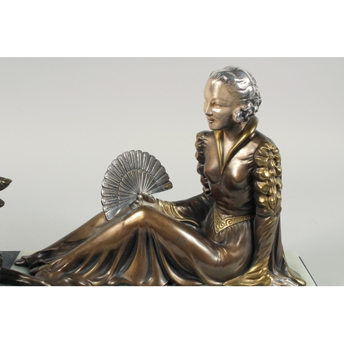 1286 - A VERY GOOD ART DECO BRONZE GROUP OF A LADY SEATED HOLDING A FAN in front of a Borzoi on an inlaid b... 