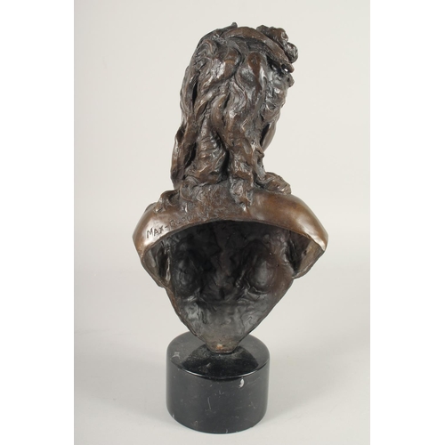 1295 - AFTER MAX BLONDEL. A BRONZE BUST OF A YOUNG LADY. Signed.  15ins high on a circular base.