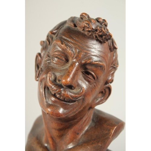 1312 - SCHACH AN ART DECO CARVED WOOD BUST OF A MAN ON A PLINTH. W. GOGGS sc. 1914 PAETZ. 14.5ins high.... 