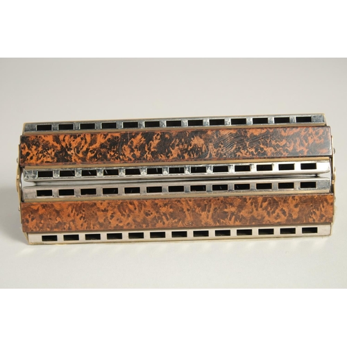 1313 - M. HOHNER. CHROMATIC BOSS HARMONICA. No. 265. 8.5ins long, in a case.