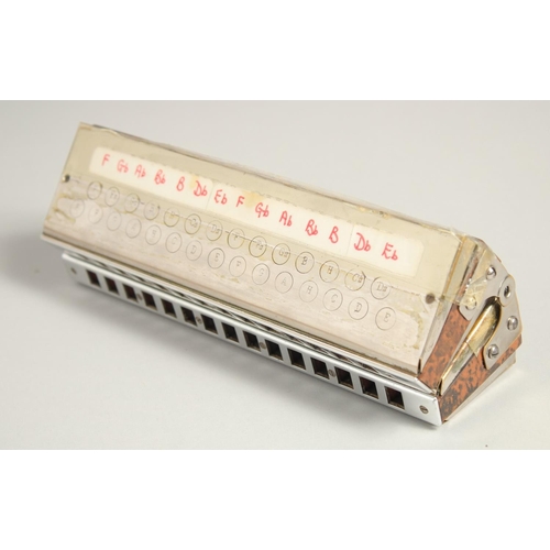 1313 - M. HOHNER. CHROMATIC BOSS HARMONICA. No. 265. 8.5ins long, in a case.