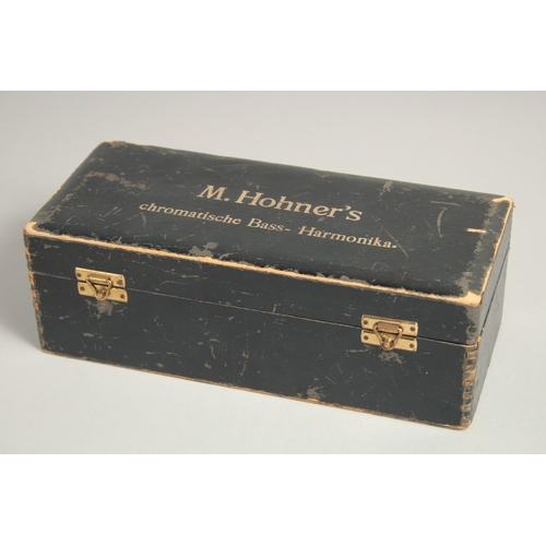 1313 - M. HOHNER. CHROMATIC BOSS HARMONICA. No. 265. 8.5ins long, in a case.