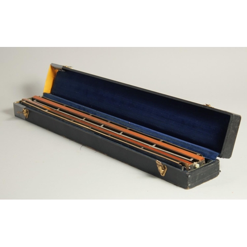 1315 - M. HOHNER. A LONG DOUBLE HARMONICA. 23ins long, in a case.