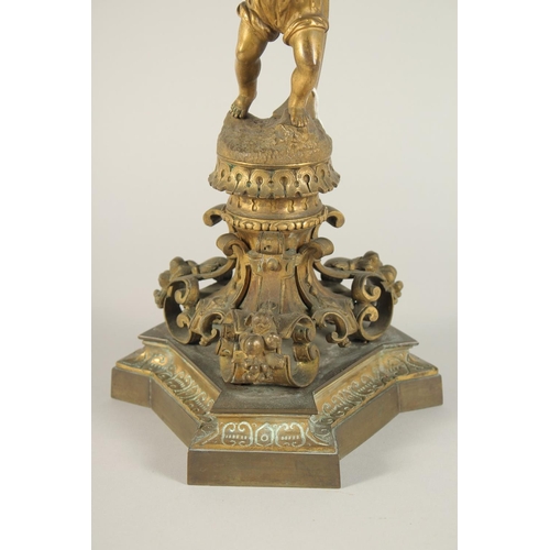 1318 - A GOOD PAIR OF 19TH CENTURY FRENCH ORMOLU SIX LIGHT CANDELABRAS with dwarf figures on a base with ma... 