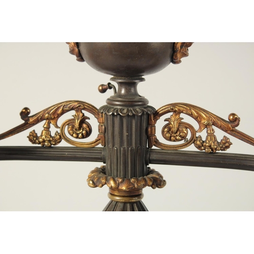 1321 - THOMAS MESSENGER. A REGENCY BRONZE AND ORMOLU TWO LIGHT CANDELABRA with outstretched arms and an urn... 