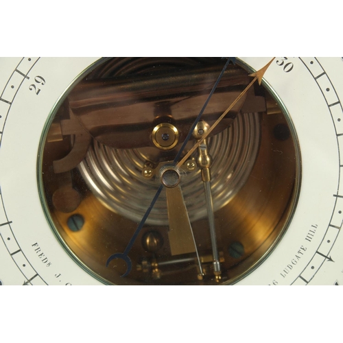 1322 - A GOOD HOLOSTERIC CIRCULAR BAROMETER by Fred J. COX, 26 Ludgate Hill, London, on a superb bronze bas... 