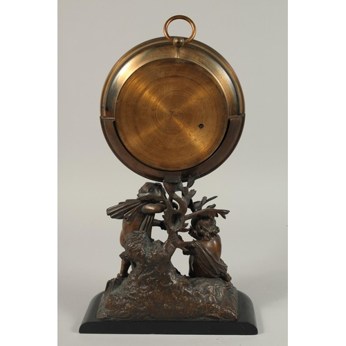 1322 - A GOOD HOLOSTERIC CIRCULAR BAROMETER by Fred J. COX, 26 Ludgate Hill, London, on a superb bronze bas... 