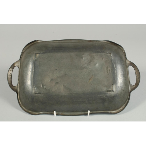 1324 - AN ART DECO TWO HANDLED TRAY stamped KAYSERZINN 4627. 13ins long.