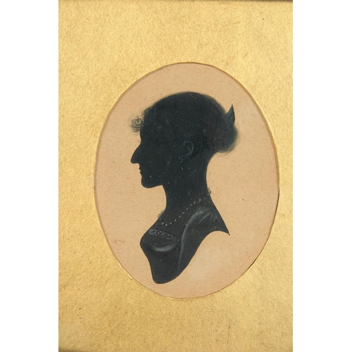 1325 - A GOOD VICTORIAN GILT FRAMED SILHOUETTE of a lady, head and shoulders. 2.75ins x 2ins.