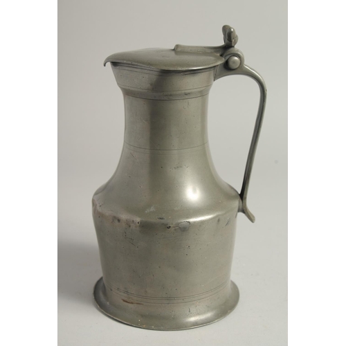 1330 - A LARGE 18TH CENTURY NORMANDY JUG AND COVER. 10ins high.