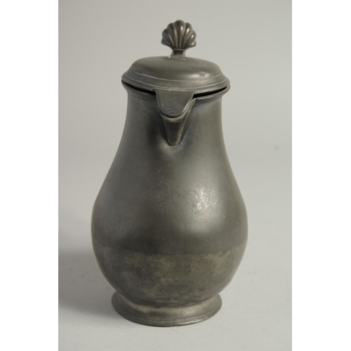 1335 - A LARGE 18TH CENTURY PEWTER JUG AND COVER. 10ins high.