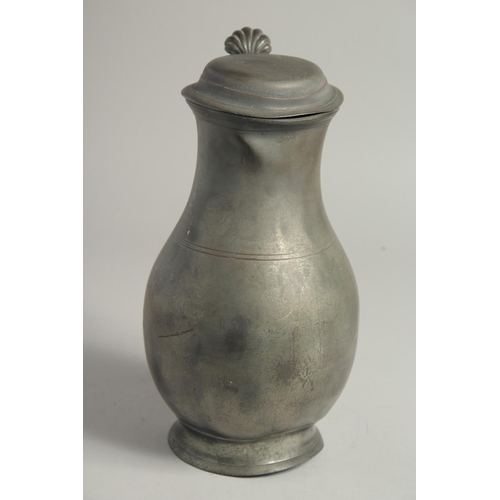 1336 - AN 18TH CENTURY PEWTER FLEMISH PEWTER FLAGON AND COVER. 11ins high.