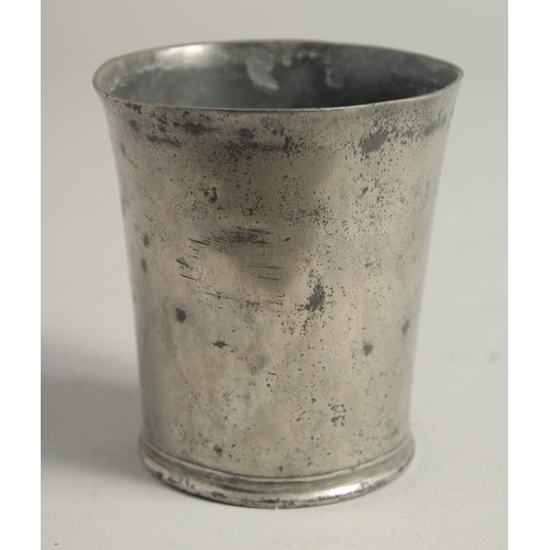 1339 - A 17TH CENTURY PEWTER MEASURE. 3ins high