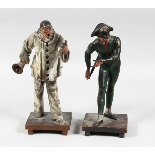 1340 - A PAINTED AUSTRIAN CLOWN with a hand bell, 10ins high and one of PIERROT, 10ins high. (2).