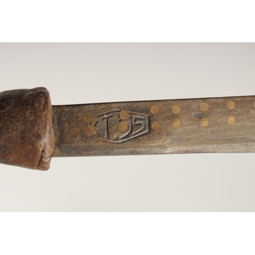 1342 - A BONE HANDLED KRIS SWORD in a wooden sheath. 2ft 4ins long.