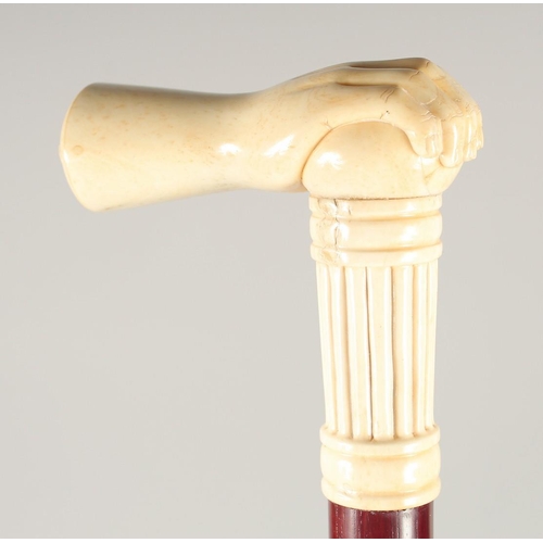 1367 - A CARVED BONE HANDLE WALKING STICK, 'HAND'. 3ft long