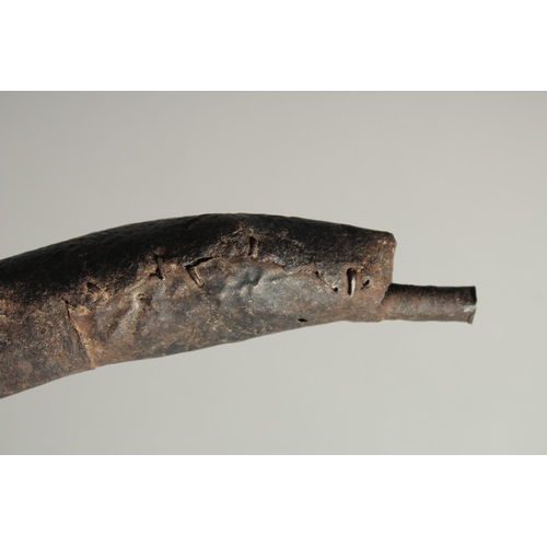 1392 - A RARE EARLY WOOD AND METAL TRIBAL PIPE. 16ins long.