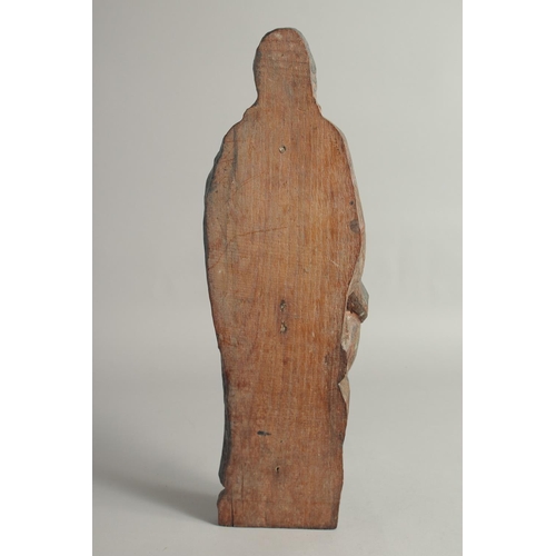 1393 - AN EARLY CARVED WOOD FLAT BACKED RELIGIOUS FIGURE. 19.5ins long.