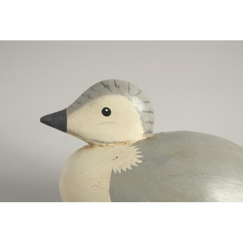 1394 - A GOOD PAINTED WOODEN DECOY PIGEON. 14ins long.