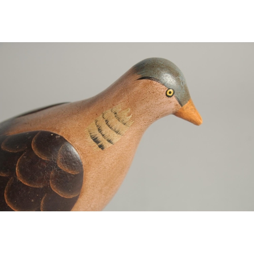 1395 - A GOOD PAINTED WOODEN DECOY DUCK. 9ins long.