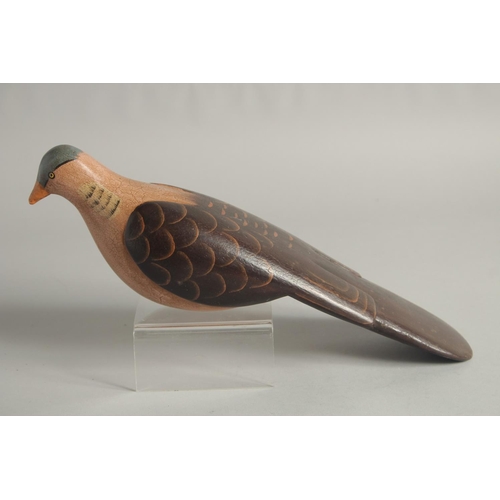 1395 - A GOOD PAINTED WOODEN DECOY DUCK. 9ins long.