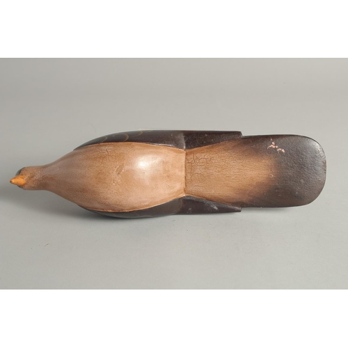 1395 - A GOOD PAINTED WOODEN DECOY DUCK. 9ins long.