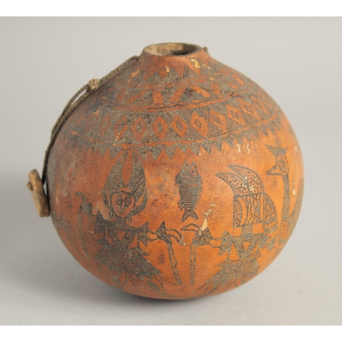 1404 - A GOOD TRIBAL DECORATED GOURD. 6ins.