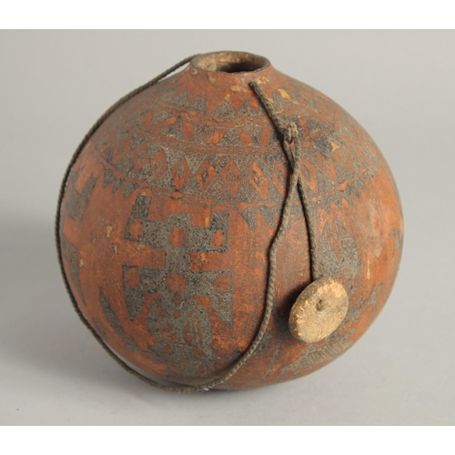 1404 - A GOOD TRIBAL DECORATED GOURD. 6ins.