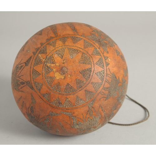 1404 - A GOOD TRIBAL DECORATED GOURD. 6ins.