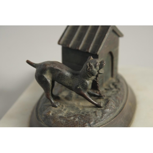 1410 - A BRONZED OVAL INKSTAND with a dog, on a marble base. 6.5ins