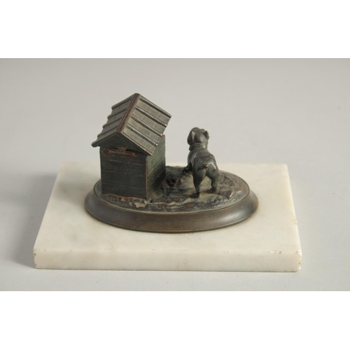 1410 - A BRONZED OVAL INKSTAND with a dog, on a marble base. 6.5ins